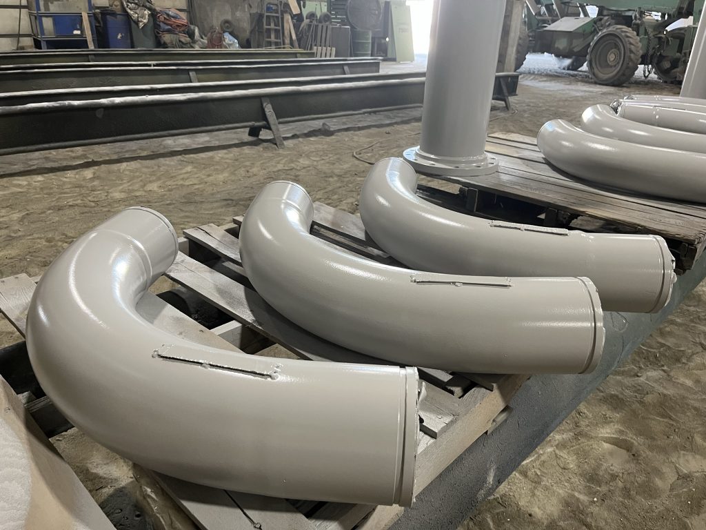 Gray spools or bent pipes