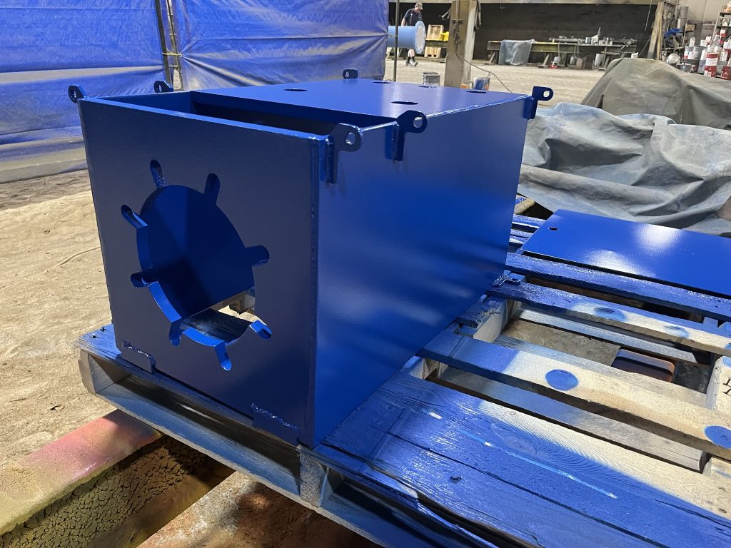 Complex blue painted metal parts