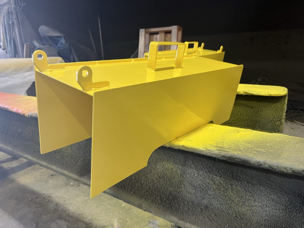 Complex yellow painted parts