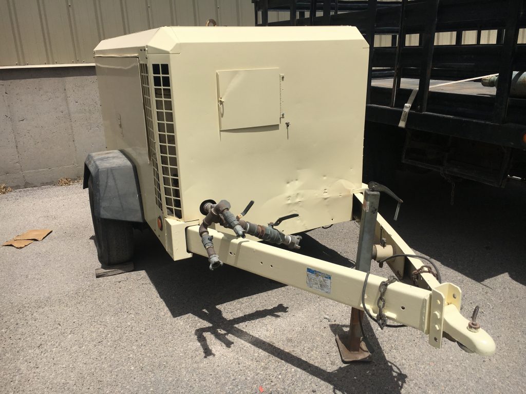 Beige trailer or HVAC-style equipment