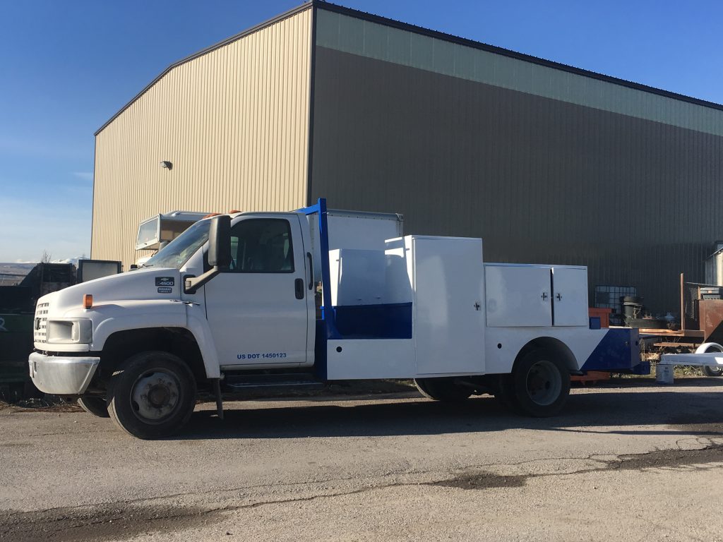 Utility truck white and blue compartments